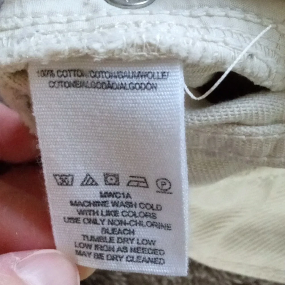 We the Free 27 waist cream colored five pocket distressed miniskirt